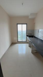 Kitchen Image of 900 Sq.ft 2 BHK Apartment / Flat for rent in Palm Vista A1 &amp; A2, Shilphata Thane for Rs. 22000