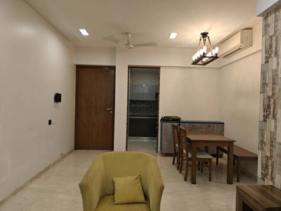 Living Room Image of 900 Sq.ft 2 BHK Apartment / Flat for sale in Ajmera Manhattan Building 3A And 3B, Wadala East Mumbai for Rs. 28000000