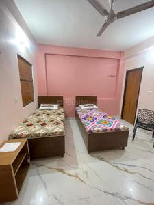 Bedroom Image of J.S LUXURY PG in Bajidpur, Noida
