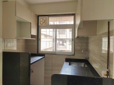 Kitchen Image of 550 Sq.ft 1 BHK Apartment / Flat for sale in Lashkaria Pearl, Andheri West Mumbai for Rs. 11000000