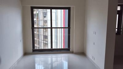 Living Room Image of 570 Sq.ft 1 BHK Apartment / Flat for sale in Kalptaru Srishti Namah, Mira Road East Mira Bhayandar for Rs. 9500000