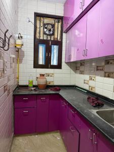 Kitchen Image of 650 Sq.ft 2 BHK Builder Floor for rent in Sector 7 Rohini New Delhi for Rs. 20000