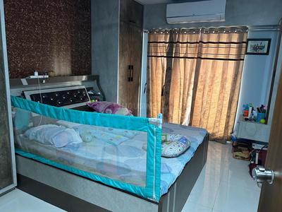 Bedroom Image of 1280 Sq.ft 2 BHK Apartment / Flat for sale in Devshree Benito, Jahangir Pura Surat for Rs. 4800000