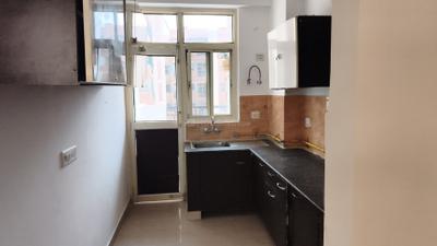 Kitchen Image of 1275 Sq.ft 2.5 BHK Apartment / Flat for sale in Gardenia Square II, Crossings Republik Ghaziabad for Rs. 8500000