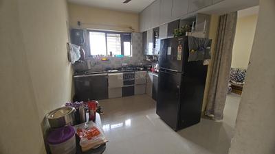 Kitchen Image of 920 Sq.ft 2 BHK Apartment / Flat for sale in Pimple Gurav Pune for Rs. 6700000