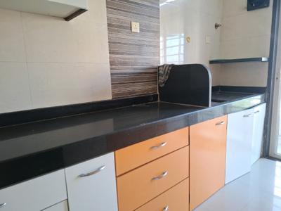 Kitchen Image of 660 Sq.ft 1 BHK Apartment / Flat for sale in Om Shivam Arjun, Kamothe Navi Mumbai for Rs. 7600000
