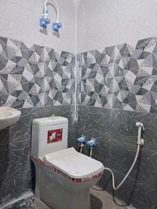 Common Bathroom Image of 650 Sq.ft 1 BHK Apartment / Flat for sale in Krishna Apartment, Sector 49 Noida for Rs. 2800000