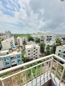 Balcony Image of 690 Sq.ft 1 BHK Apartment / Flat for rent in Surya Nagari society, Pimple Gurav Pune for Rs. 15000