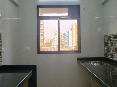 Kitchen Image of 720 Sq.ft 1 BHK Apartment / Flat for sale in Mohan Precious Greens Phase I, Ambernath East Ambernath for Rs. 3498000