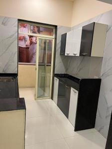 Kitchen Image of 730 Sq.ft 1 BHK Apartment / Flat for sale in Mohan Precious Greens, Ambernath East Ambernath for Rs. 3500000