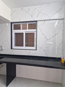 Kitchen Image of 1350 Sq.ft 3 BHK Apartment / Flat for sale in Nirman Aura, Ambegaon Budruk Pune for Rs. 11500000