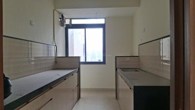 Kitchen Image of 1000 Sq.ft 2 BHK Apartment / Flat for rent in Dynamix Divum, Malad East Mumbai for Rs. 74000