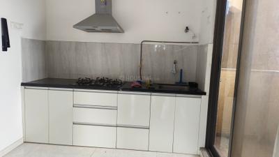 Kitchen Image of 1000 Sq.ft 2 BHK Apartment / Flat for rent in Manhattan, Charholi Budruk Pune for Rs. 24500