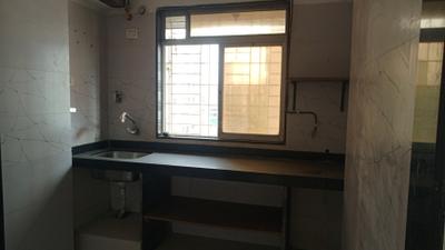 Kitchen Image of 680 Sq.ft 2 BHK Apartment / Flat for sale in Hirani Samruddhi CHS, Kurla East Mumbai for Rs. 14000000