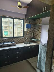 Kitchen Image of 780 Sq.ft 1 BHK Apartment / Flat for rent in Signature Vrajdham, Ujala Circle Ahmedabad for Rs. 21000