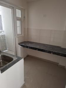 Kitchen Image of 1050 Sq.ft 2 BHK Apartment / Flat for sale in Shri Radha Aqua Garden, Noida Extension Greater Noida for Rs. 8800000