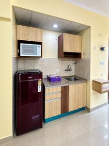 Kitchen Image of 450 Sq.ft 1 RK Studio for rent in Supertech Ecociti, Sector 137 Noida for Rs. 21000