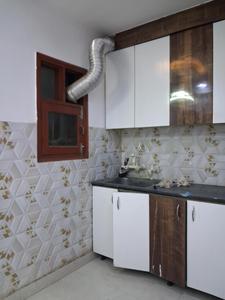 Kitchen Image of 950 Sq.ft 2 BHK Apartment / Flat for rent in Sector 49 Noida for Rs. 24500