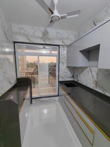 Kitchen Image of 600 Sq.ft 1 BHK Apartment / Flat for sale in MS Vrindavan City Building A And B, Ambivli Thane for Rs. 2999000