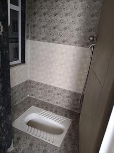 Common Bathroom One Image of 650 Sq.ft 1 BHK Apartment / Flat for sale in Dharti Krishna, Pushpak Nagar Navi Mumbai for Rs. 4620000