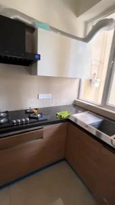 Kitchen Image of 883 Sq.ft 1 BHK Apartment / Flat for rent in Green Lotus Saksham, Nabha Zirakpur for Rs. 26000