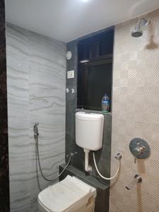 Common Bathroom Image of 550 Sq.ft 1 BHK Apartment / Flat for rent in Unnati Woods Phase 7, Kasarvadavali Thane for Rs. 17999