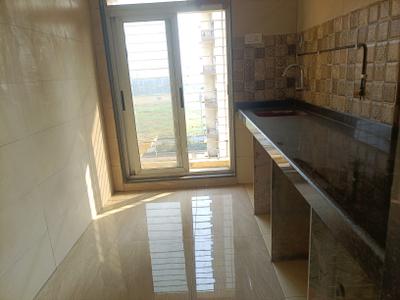 Kitchen Image of 700 Sq.ft 1 BHK Apartment / Flat for sale in Giriraj Sapphire, Kharghar Navi Mumbai for Rs. 6000000