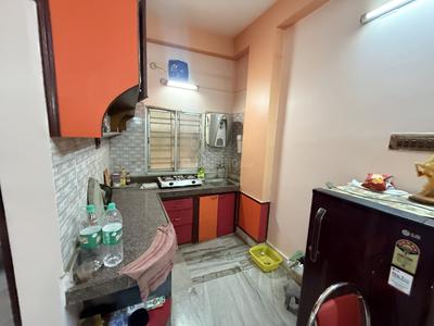 Kitchen Image of 950 Sq.ft 2 BHK Apartment / Flat for sale in Airport Gate No 2 Kolkata for Rs. 3600000