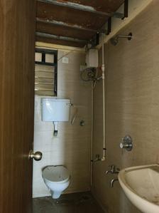 Common Bathroom One Image of 850 Sq.ft 2 BHK Apartment / Flat for sale in Raunak City Sector IV D10, Kalyan West Kalyan for Rs. 6000000