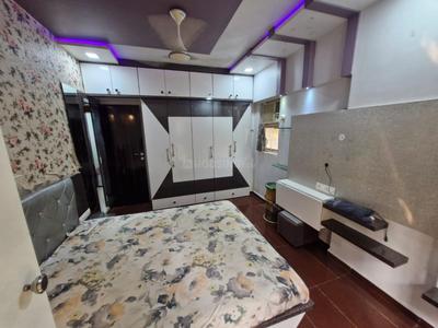 Bedroom Image of 900 Sq.ft 2 BHK Apartment / Flat for rent in Thakur Mahadev Tower, Kandivali East Mumbai for Rs. 60000
