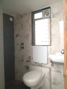Common Bathroom Image of 699 Sq.ft 2 BHK Apartment / Flat for sale in Mansarovar Ariana, Vasai West Vasai for Rs. 5190000