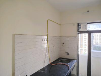 Kitchen Image of 700 Sq.ft 1 BHK Apartment / Flat for rent in Puraniks Aarambh, Kasarvadavali Thane for Rs. 17128