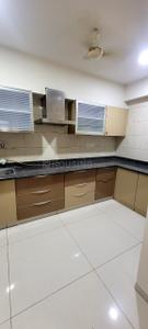 Kitchen Image of 1629 Sq.ft 3 BHK Apartment / Flat for sale in Aroma Tirupati Aakruti Greenz, Chharodi Ahmedabad for Rs. 9400000