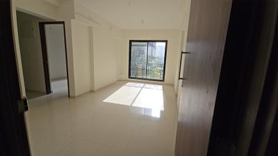 Living Room Image of 550 Sq.ft 2 BHK Apartment / Flat for sale in Puneet Shivalaya, Vikhroli East Mumbai for Rs. 12300000