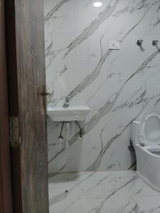 Common Bathroom Image of 720 Sq.ft 2 BHK Apartment / Flat for sale in New building, Chhattarpur New Delhi for Rs. 4800000