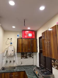 Kitchen Image of 500 Sq.ft 2 BHK Builder Floor for rent in Krishna Nagar New Delhi for Rs. 23000