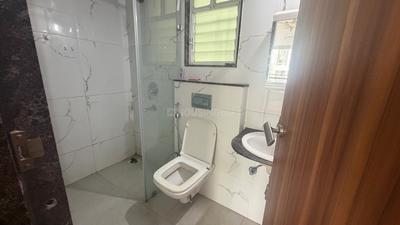 Bathroom Image of 920 Sq.ft 2 BHK Apartment / Flat for rent in Chandrarang Basileo, Pimple Gurav Pune for Rs. 35000