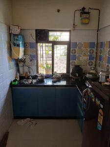Kitchen Image of 550 Sq.ft 1 BHK Apartment / Flat for rent in Raunak Heights, Kasarvadavali Thane for Rs. 23000
