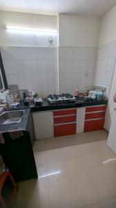 Kitchen Image of 1280 Sq.ft 3 BHK Apartment / Flat for sale in Raviraj Rakshak Nagar Gold, Kharadi Pune for Rs. 14900000