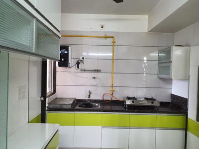 Kitchen Image of 980 Sq.ft 2 BHK Apartment / Flat for rent in Ratna Ruchi Vatika, Navrangpura Ahmedabad for Rs. 30000