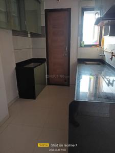 Kitchen Image of 720 Sq.ft 1 BHK Apartment / Flat for rent in Shree Complex, Chala Vapi for Rs. 7500