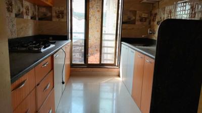 Kitchen Image of 1225 Sq.ft 2 BHK Apartment / Flat for rent in Paradise Sai Crystals, Kharghar Navi Mumbai for Rs. 40000