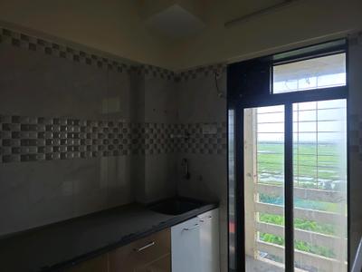 Kitchen Image of 600 Sq.ft 1 BHK Apartment / Flat for sale in Siddhagiri Kalpana Garden, Nalasopara East Nala Sopara for Rs. 3800000