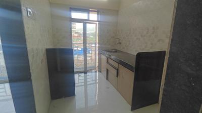 Kitchen Image of 600 Sq.ft 1 BHK Apartment / Flat for sale in Elite Tower, Nalasopara West Nala Sopara for Rs. 3199999