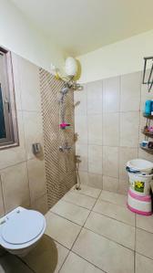 Bathroom Image of 1430 Sq.ft 3 BHK Apartment / Flat for sale in Skyi Songbirds , Bhugaon Pune for Rs. 13000000