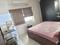 Poojan Apartment Bedroom 3