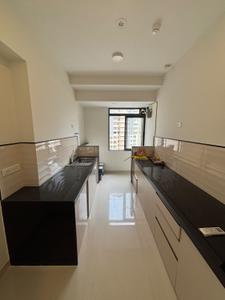 Kitchen Image of 900 Sq.ft 2 BHK Apartment / Flat for rent in Dynamix Divum, Malad East Mumbai for Rs. 69000