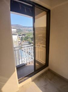 Balcony Image of 650 Sq.ft 1 BHK Apartment / Flat for rent in Saburi Vaym Towers, Khopoli Navi Mumbai for Rs. 8500
