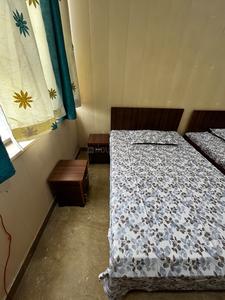 Bedroom Image of Girls PG, Arun Vihar, Contact 98189 33548 in Sector 37, Noida