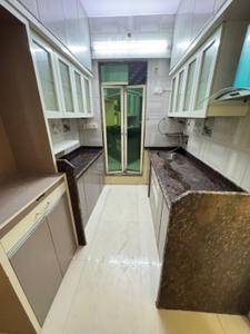 Kitchen Image of 1050 Sq.ft 2 BHK Apartment / Flat for sale in Kalyan West Kalyan for Rs. 6500000